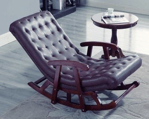 A wooden rocket chair and a small table